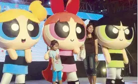  ??  ?? Cartoon Network’s Powerpuff Girls with fans