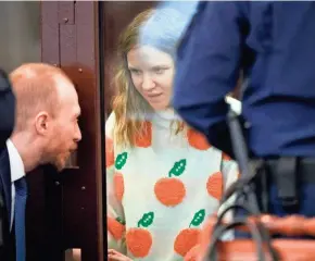  ?? DMITRI LOVETSKY/AP ?? Darya Trepova, a suspect in a bombing that killed a Russian military blogger, talks with her lawyer Thursday during a court hearing in St. Petersburg, Russia.