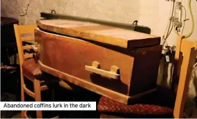  ??  ?? Abandoned coffins lurk in the dark