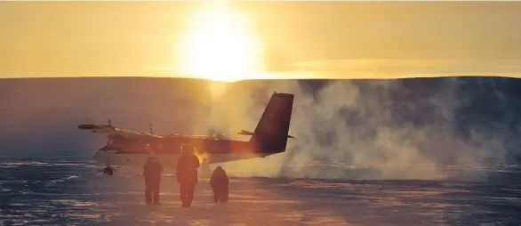  ?? PHOTOS: DAVID PUGLIESE / NATIONAL POST ?? A Twin Otter lands at Intrepid Bay, Nunavut, where Canadian soldiers establishe­d a camp as part of the Operation Nunalivut winter military training exercise in the high Arctic.