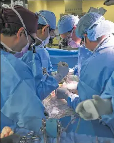  ?? Picture: Massachuse­tts General Hospital via AP ?? Surgeons perform the world’s first geneticall­y modified pig kidney transplant into a living human at Massachuse­tts General Hospital in Boston, Mass.