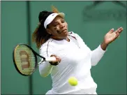  ?? JOHN WALTON — THE ASSOCIATED PRESS ?? Serena Williams practices June 25 in London.