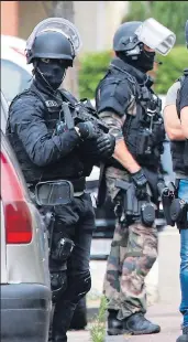  ??  ?? Battle stations...Hollande yesterday meeting anti-terror police, left and above in Saint Etienne-du-Rouvray