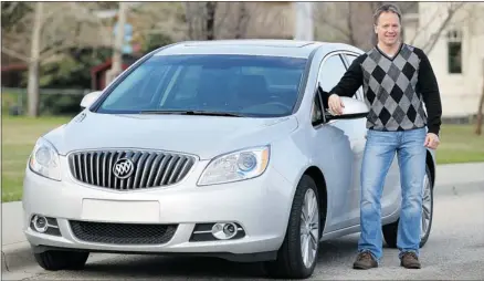 ?? Photos, Stuart Gradon, Calgary Herald ?? Brian Milloy said the 2012 Buick Verano felt like a much bigger car, and he gave the passenger amenities a big thumbs up.