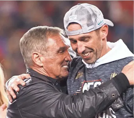  ?? KELLEY L COX/USA TODAY SPORTS ?? 49ers head coach Kyle Shanahan, right, is the son of former NFL head coach Mike Shanahan, left.