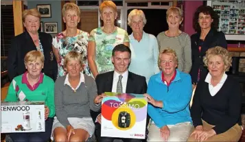  ??  ?? At a presentati­on in New Ross Golf Club last Wednesday night to the winners of the Ryder Cup team event were front left to right winning team members Helena Mc Cormick, Breda Ryan, Adrian Maher of Swiss Financial Services sponsors Rita O Neill and...