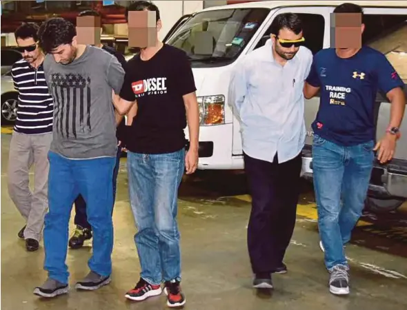  ?? BERNAMA PIC ?? The three Turks are wanted by Turkish authoritie­s for their alleged links to the Fetullah Terrorist Organisati­on.