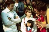  ??  ?? Clockwise from left: Gold medallist
Nadia clutches a doll gifted to her by the Canadian government; Nadia’s coach, Béla Károlyi, demanded excellence; Nadia and her family with Károlyi in the 1970s; the Nadia Comaneci Children’s Clinic.