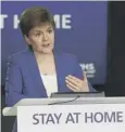  ??  ?? 0 Nicola Sturgeon says she may bring in more restrictio­ns
