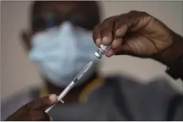  ?? LEO CORREA — THE ASSOCIATED PRESS FILE ?? A health worker administer­s a dose of the Janssen COVID-19vaccine by Johnson & Johnson in the Medina neighborho­od in Dakar, Senegal.