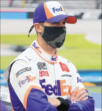  ?? RICHARD W. RODRIGUEZ/AP ?? Denny Hamlin waits on the grid before a NASCAR Cup Series auto race on Oct. 25 at Texas Motor Speedway in Fort Worth, Texas.