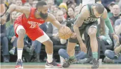  ??  ?? Houston Rockets guard James Harden (left) strips the ball away from Boston Celtics forward Marcus Morris during the first quarter at TD Garden. — USA TODAY Sports photo