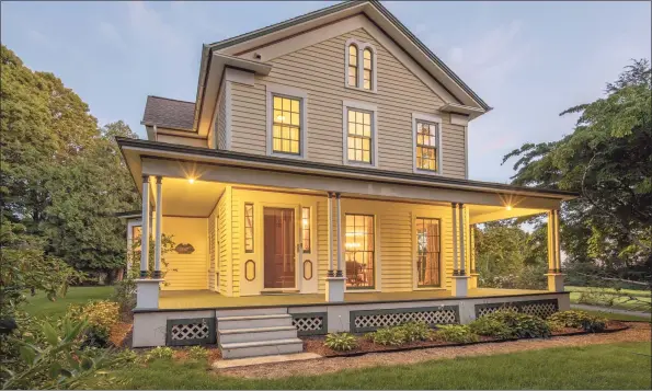  ?? Contribute­d photos ?? This charming circa 1867 Victorian has been updated and features a 3- story barn that houses a garage, workbenche­s, home office, and pool house.