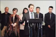  ?? Hearst Connecticu­t Media file photo ?? Attorney Joshua Koskoff and the Sandy Hook families that are suing gunmaker Remington gather in Bridgeport in 2016.