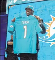  ?? [AP PHOTO] ?? The Miami Dolphins selected offensive tackle Laremy Tunsil in the first round on Thursday night.