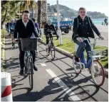  ??  ?? Mayor of Nice Christian Estrosi rides with Tour winner Bernard Thévenet