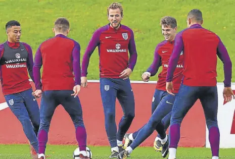  ?? AFP ?? Harry Kane (centre) scored 13 goals in September including two for England against Malta.