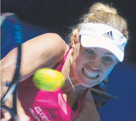  ?? Picture: TONY ASHBY/AFP ?? OPEN SEASON: Angelique Kerber launches a return against Eugenie Bouchard on day five at the Hopman Cup.