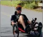  ?? PHOTO BY MICHILEA PATTERSON — FOR MEDIANEWS GROUP ?? A man participat­ing in the 2019Ride for the River cycling event uses a recumbent tricycle for the journey which takes place along the Schuylkill River Trail.