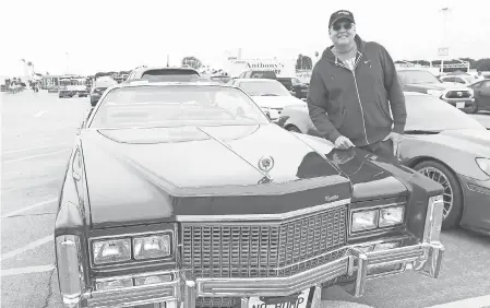  ?? DAN MACMEDAN/ USA TODAY ?? James Daurio poses with his 1976 Cadillac Eldorado at the Cars and Coffee car gathering in Costa Mesa, California, in 2016.