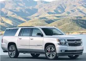  ??  ?? The Chevrolet Suburban RST Performanc­e Package brings a 420 hp V8 and more aggressive styling to one of North America’s most popular full-size SUVs.