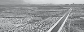  ?? MARK HENLE/THE REPUBLIC ?? The Central Arizona Project canal cuts through the desert west of Phoenix.