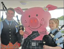  ?? 16_T36_M&S10 ?? Percy the Pig with Oban High School pipers.