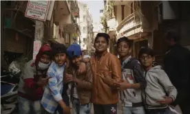  ?? Photograph: 8 Billion Angels Production­s ?? Children on the streets of Delhi, India. India has the second-worst air quality in the world that is cutting short the average life expectancy of Indians by 5.2 years.