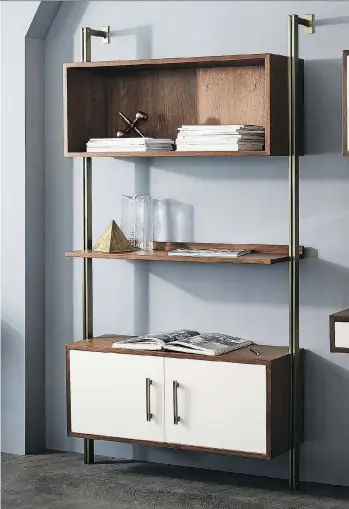  ??  ?? West Elm’s Linden Mid-Century Wide Storage Shelf Unit takes advantage of vertical space. Keep beautiful items or things you use often on the open shelving while stashing less attractive items behind the cupboard doors.