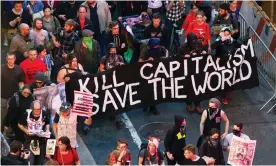  ??  ?? The Occupy Wall Street movement march down Broadway in New York City, May 2012. Photograph: Lucas Jackson/Reuters