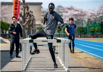  ?? -- AFP ?? South Sudan Paralympic runner Michael Machiek Ting Kutjang takes part in a training session in Maebashi.