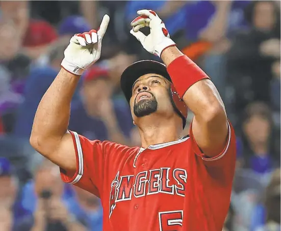  ?? JAY BIGGERSTAF­F/USA TODAY SPORTS ?? Albert Pujols is owed $87 million over the next three years.