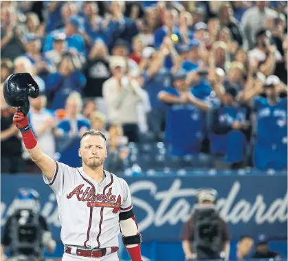  ?? RICK MADONIK TORONTO STAR ?? Blue Jays fans were on their feet in Toronto for Josh Donaldson before his first at-bat Tuesday night since being traded a year ago.