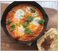  ?? (Bloomberg News/WPNS/Kate Krader) ?? Eggs in Creamy Tomato Curry