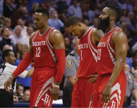  ?? SUE OGROCKI/THE ASSOCIATED PRESS ?? The Houston Rockets had every reason to hang their heads after a 5-10 start cost their coach his job. The slow start continues to haunt them.