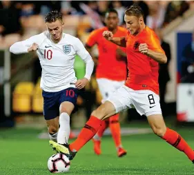  ?? REUTERS ?? King James: Maddison takes on Holland in the Under 21s last week