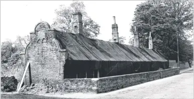  ??  ?? The Smith’s almshouses after the June 1942 blitz