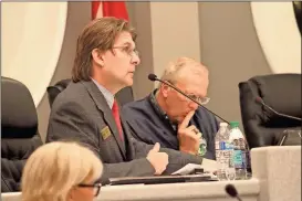  ??  ?? Ringgold City Council members Randall Franks (left) and Larry Black look on during discussion of the city’s streaming services for public meetings during the council’s Dec. 11 meeting. (Catoosa News photo/Adam Cook)