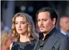  ?? ?? Amber Heard with Johnny Depp.