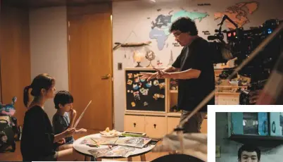  ??  ?? Left: Director Bong Joon-ho on the set of Parasite with Park So-dam and Jung Hyeon-jun. Below: The destitute Kim clan in their kitchen. Centre,
below: Cho Yeo-jeong as Yeon Kyo, the mother of the wealthy Park family.