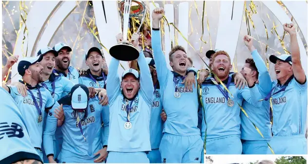  ??  ?? Don’t drop this one! England captain Eoin Morgan holds the trophy aloft