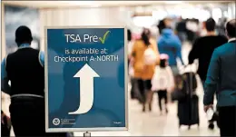  ?? DAVID J. PHILLIP/AP ?? With 800,000 employees furloughed or working without pay, the partial shutdown is starting to strain the aviation system, with unpaid security screeners staying home.