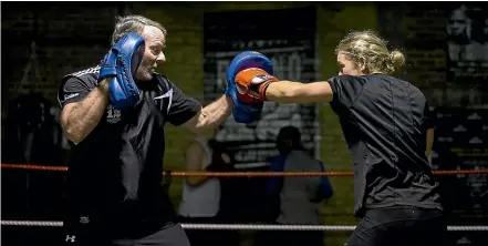  ?? ALDEN WILLIAMS/STUFF ?? Bryan Barry (left) trains university students at his Round 12 gymnasium in Christchur­ch.