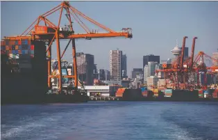  ?? DARRYL DYCK/BLOOMBERG FILES ?? Cargo through the Port of Vancouver rose one per cent last year despite the major recession. Canadian exports bounced back on the resurgent demand from the U.S. and Asian economies.