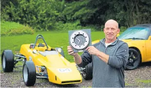  ??  ?? Andrew with trophy after his 60th anniversar­y event victory.