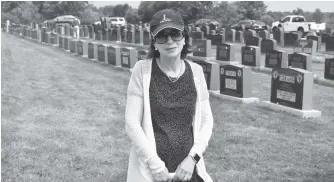  ?? DAVID JALA/CAPE BRETON POST ?? Sharon (Shore) Jacobson says she always gets emotional when she visits Glace Bay’s Hebrew cemetery. The Glace Bay native, who lived in Halifax before retiring to the Mira, was one of about 50 people who took part in a Sunday ceremony in recognitio­n of two late leaders of Glace Bay’s Jewish community. Special plaques were laid nearby in memory of Dr. Phil Simon, a town dentist, and businessma­n Elliot (Ellie) Marshall.