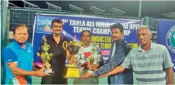  ??  ?? (from left) Ajit Bharadwaj, C. V. Anand, Waheed, HOTA president Nandyala Narasimha Reddy and HOTA treasurer Sadashiv Reddy pose with the trophies at the Hyderabad Open All India Senior Tennis Championsh­ip on Tuesday.