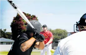  ?? Photo / Stuart Munro ?? Whanganui Braves pitcher Brad Worsley sending down another strike during his team’s narrow loss to the Manawatu Dodgers at Gonville on Saturday.