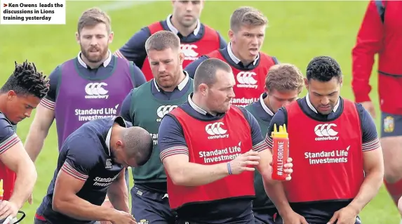  ??  ?? > Ken Owens leads the discussion­s in Lions training yesterday