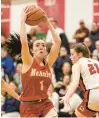  ?? VINCENT D. JOHNSON/ DAILY SOUTHTOWN ?? Mother McAuley’s Quinn Arundel weaves past Marist’s defense on Wednesday.